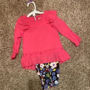 Pink long sleeve shirt and flower leggings.